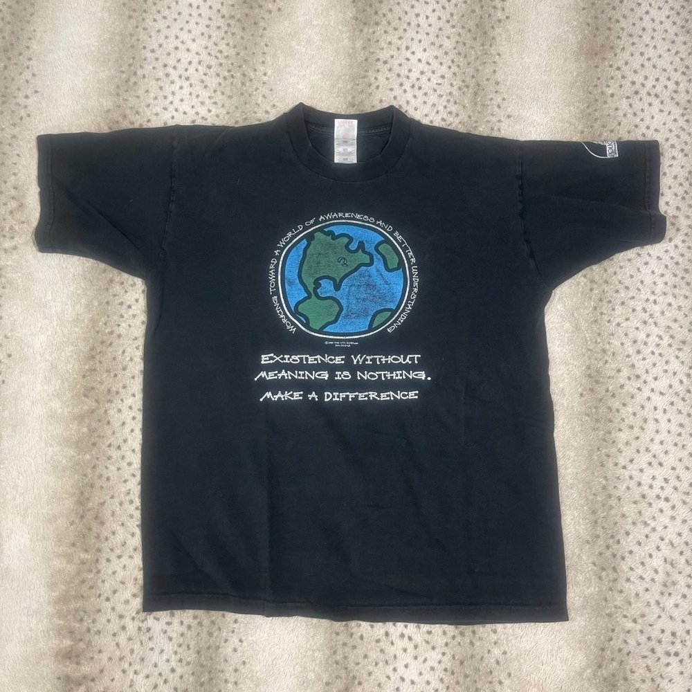 1995 vintage political shirt. Existence without meaning is nothing.